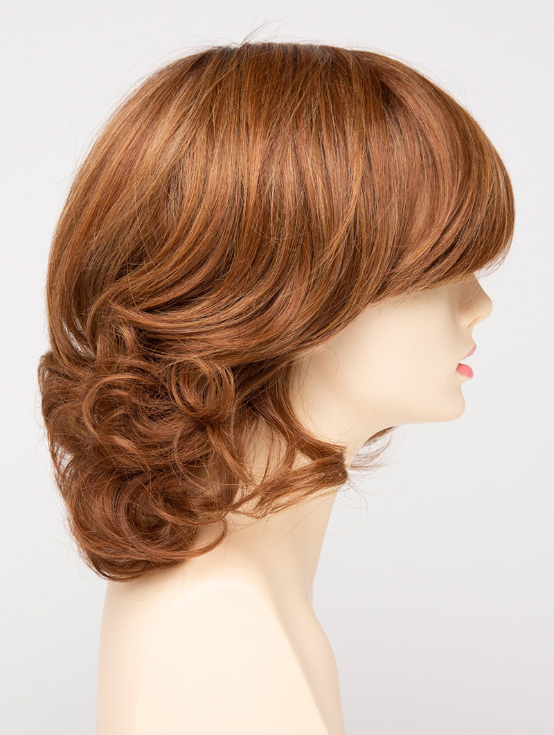 profile side of a medium Kinner Beauty Wigs wig for woman on mannequin head