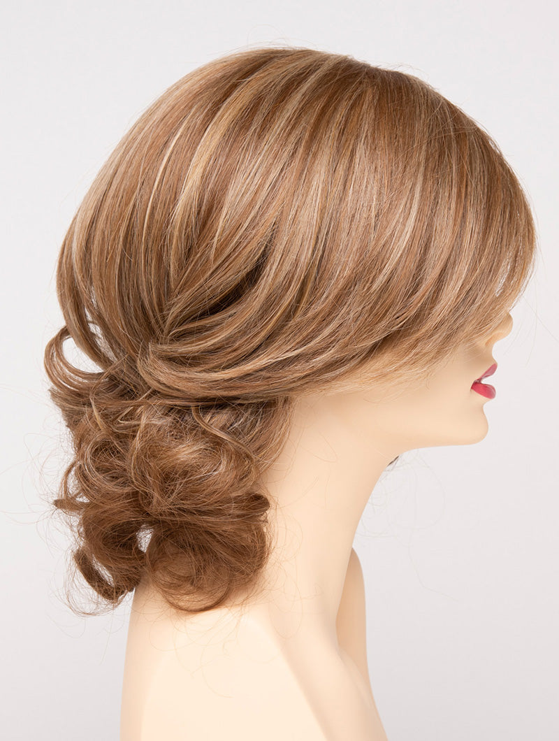 profile side of a medium Kinner Beauty Wigs wig for woman on mannequin head