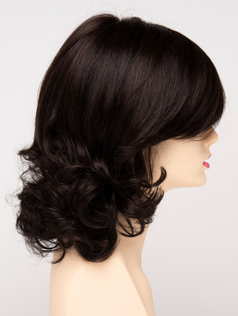 profile side of a medium Kinner Beauty Wigs wig for woman on mannequin head