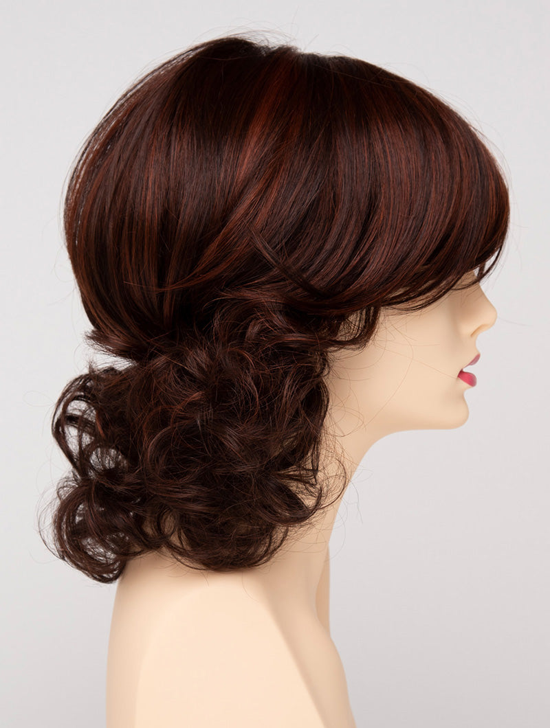 profile side of a medium Kinner Beauty Wigs wig for woman on mannequin head