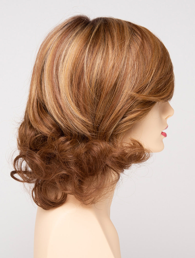 profile side of a medium Kinner Beauty Wigs wig for woman on mannequin head
