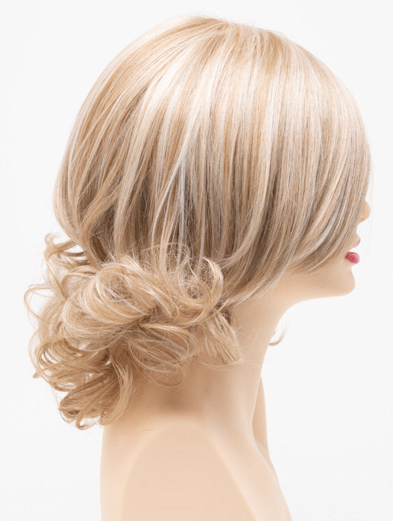 profile side of a medium Kinner Beauty Wigs wig for woman on mannequin head