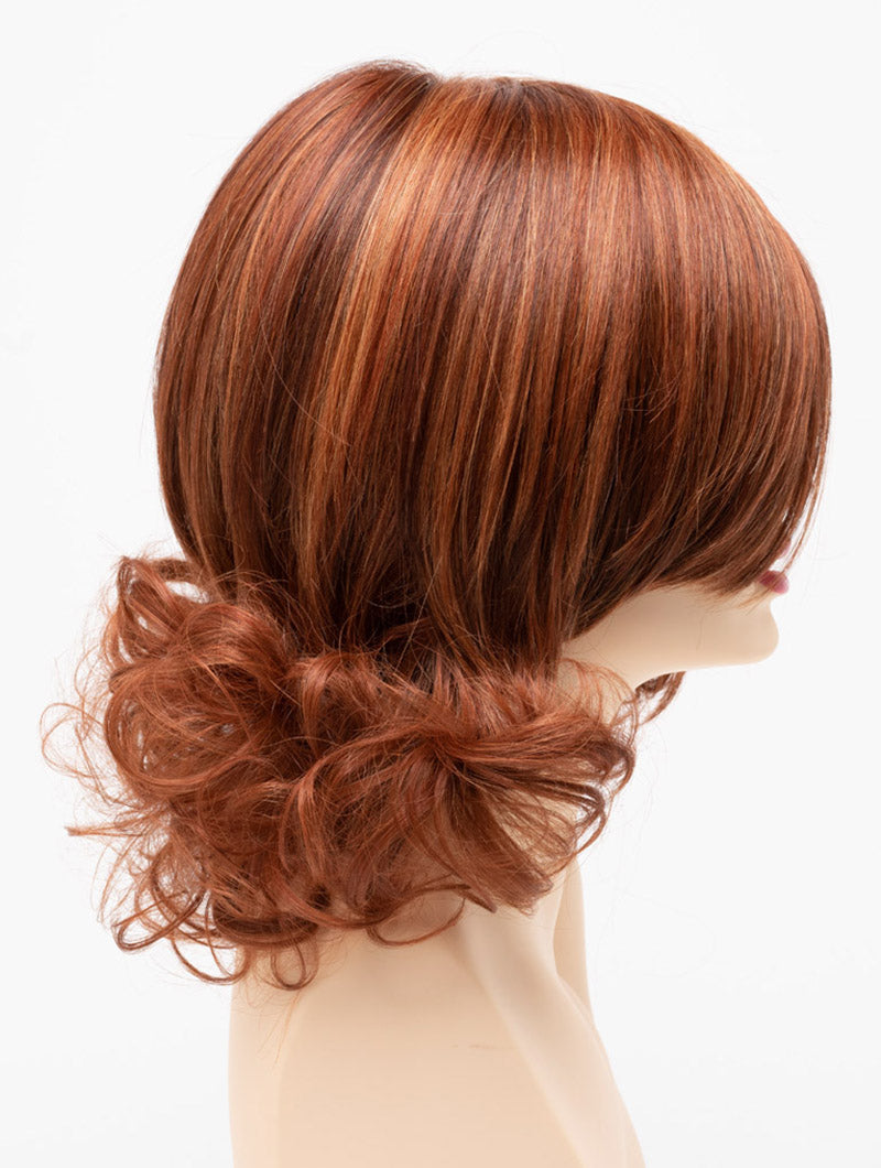 profile side of a medium Kinner Beauty Wigs wig for woman on mannequin head