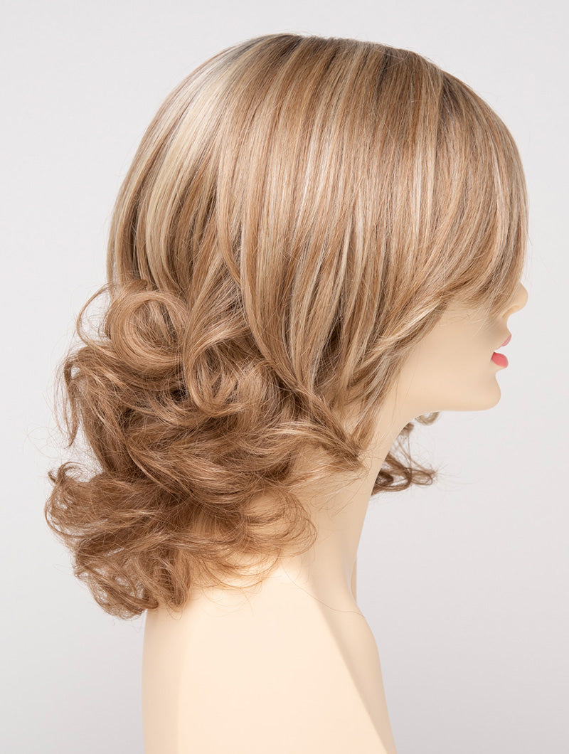 profile side of a medium Kinner Beauty Wigs wig for woman on mannequin head