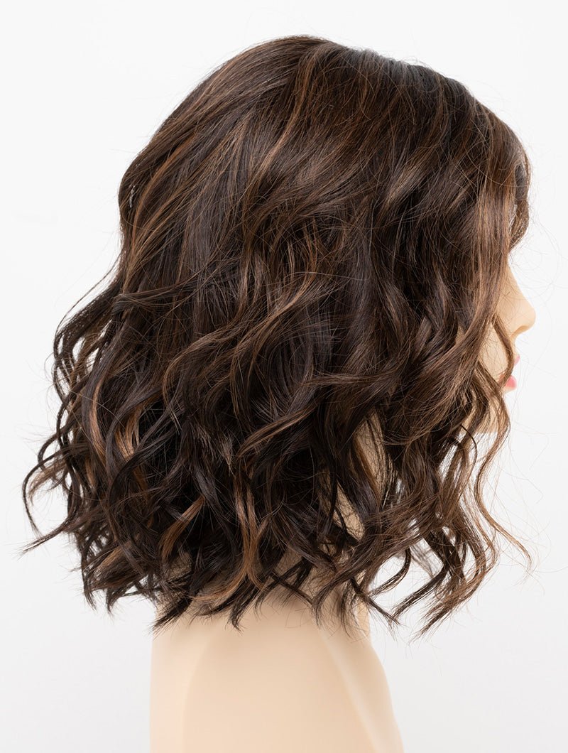 profile side of a medium Kinner Beauty Wigs wig for woman on mannequin head