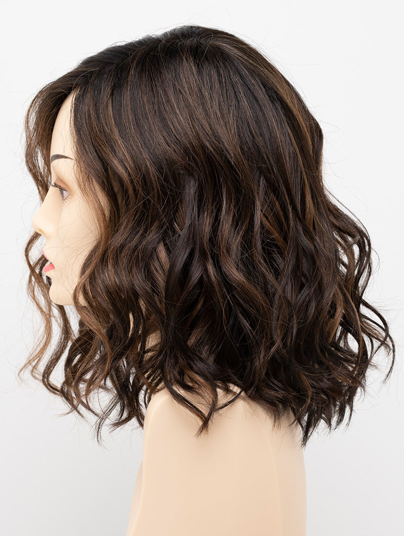 profile side of a medium Kinner Beauty Wigs wig for woman on mannequin head