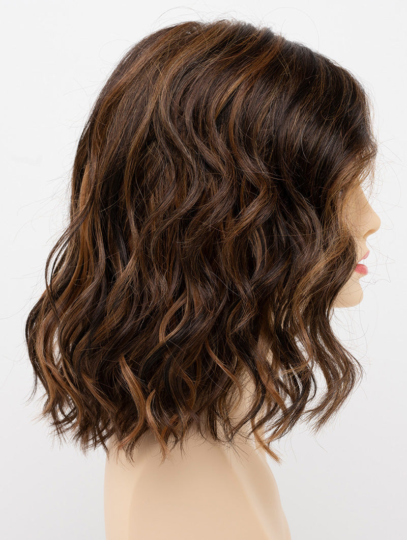 profile side of a medium Kinner Beauty Wigs wig for woman on mannequin head