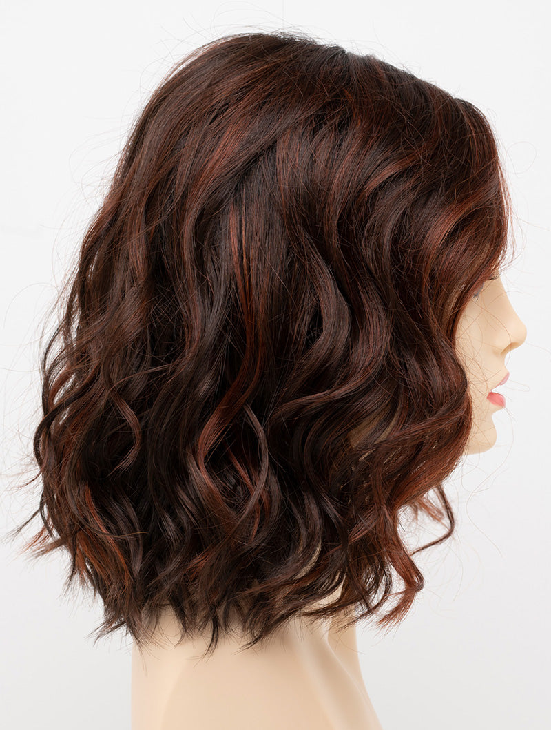 profile side of a medium Kinner Beauty Wigs wig for woman on mannequin head