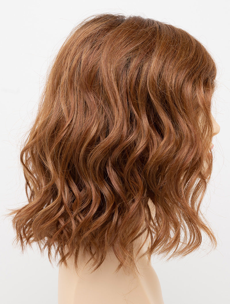 profile side of a medium Kinner Beauty Wigs wig for woman on mannequin head