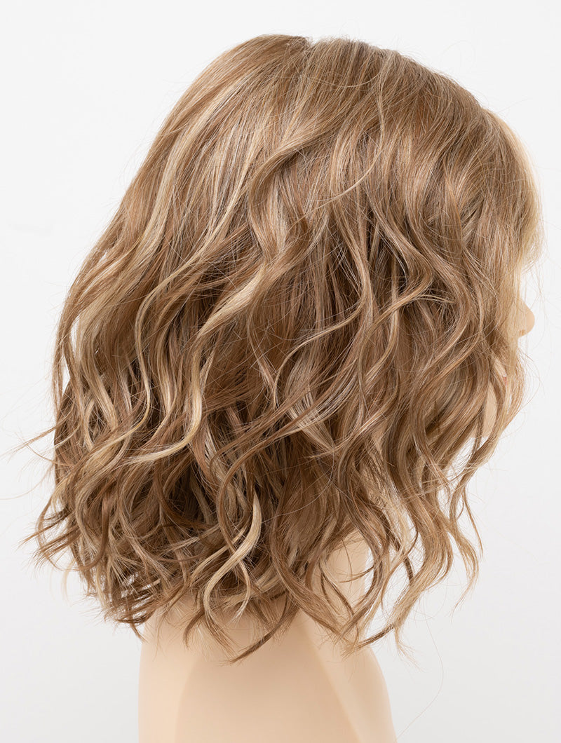 profile side of a medium Kinner Beauty Wigs wig for woman on mannequin head