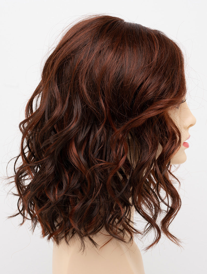 profile side of a medium Kinner Beauty Wigs wig for woman on mannequin head