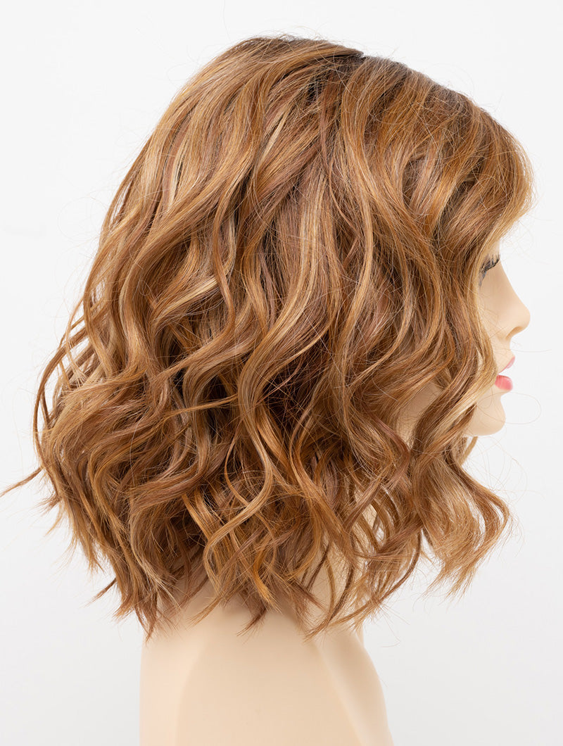 profile side of a medium Kinner Beauty Wigs wig for woman on mannequin head