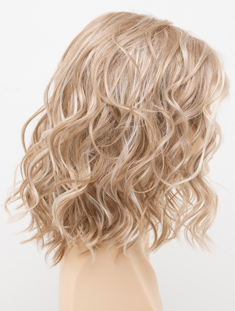 profile side of a medium Kinner Beauty Wigs wig for woman on mannequin head