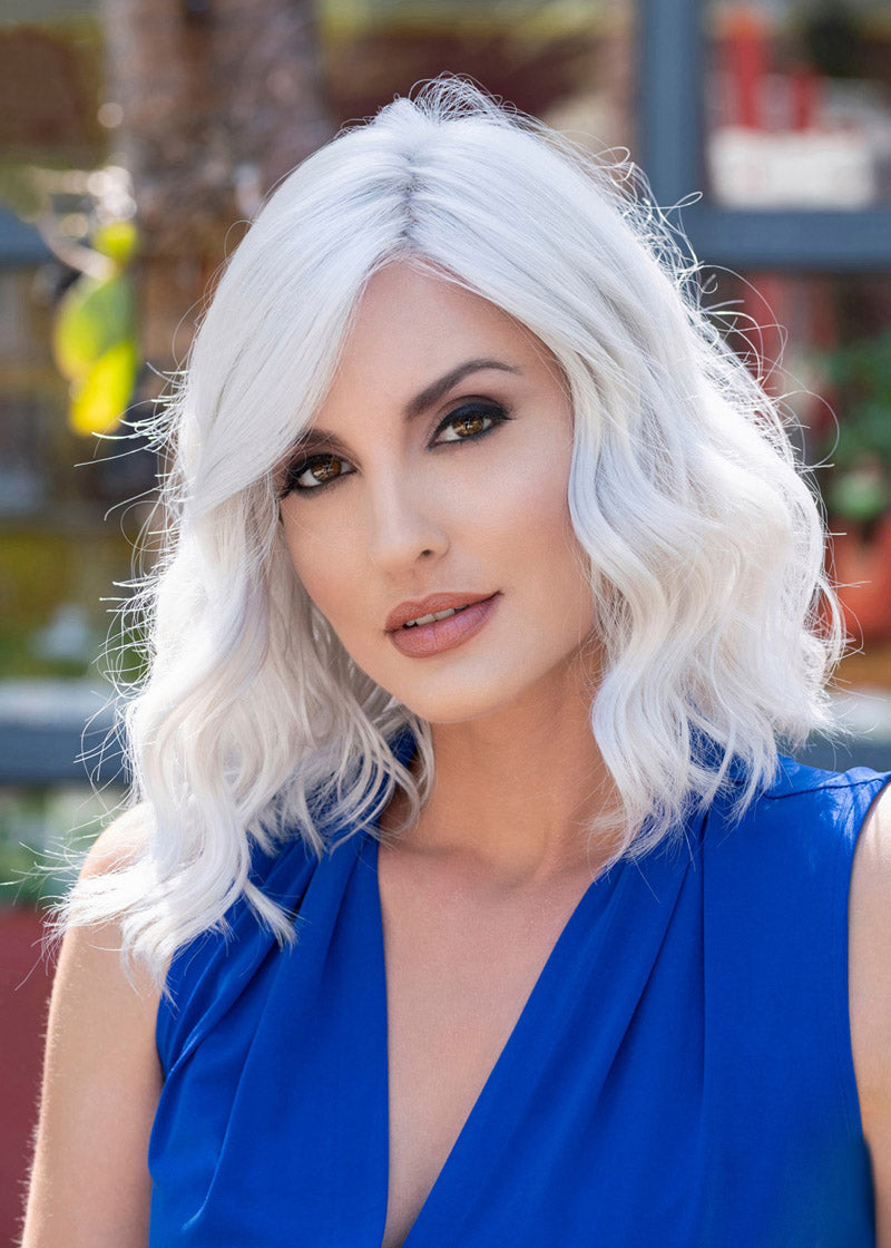 front side of a medium Kinner Beauty Wigs wig on woman head