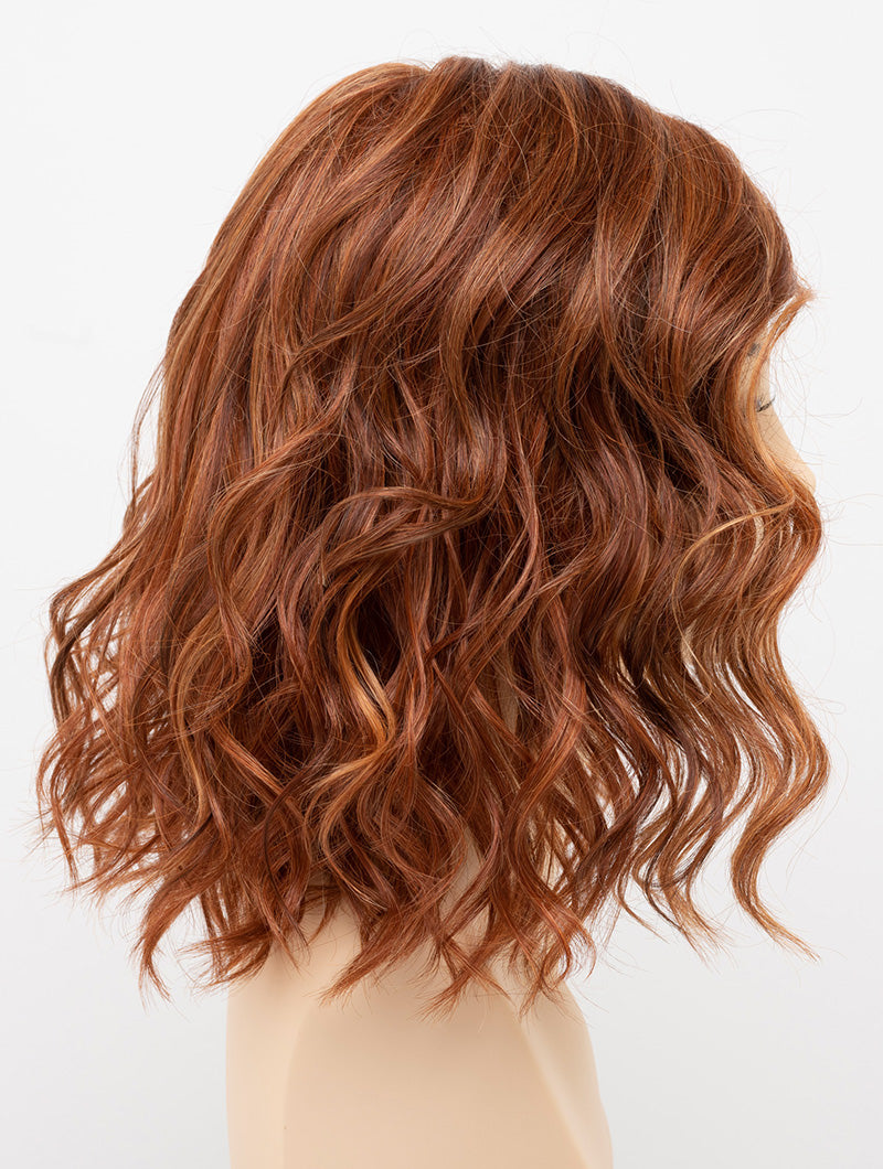 profile side of a medium Kinner Beauty Wigs wig for woman on mannequin head