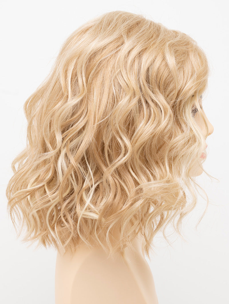 profile side of a medium Kinner Beauty Wigs wig for woman on mannequin head