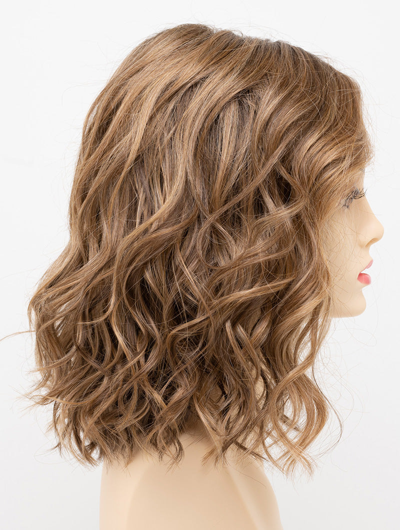 profile side of a medium Kinner Beauty Wigs wig for woman on mannequin head