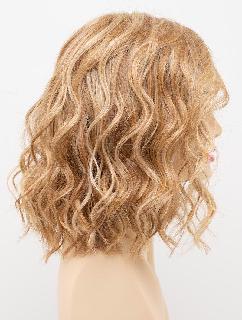 profile side of a medium Kinner Beauty Wigs wig for woman on mannequin head