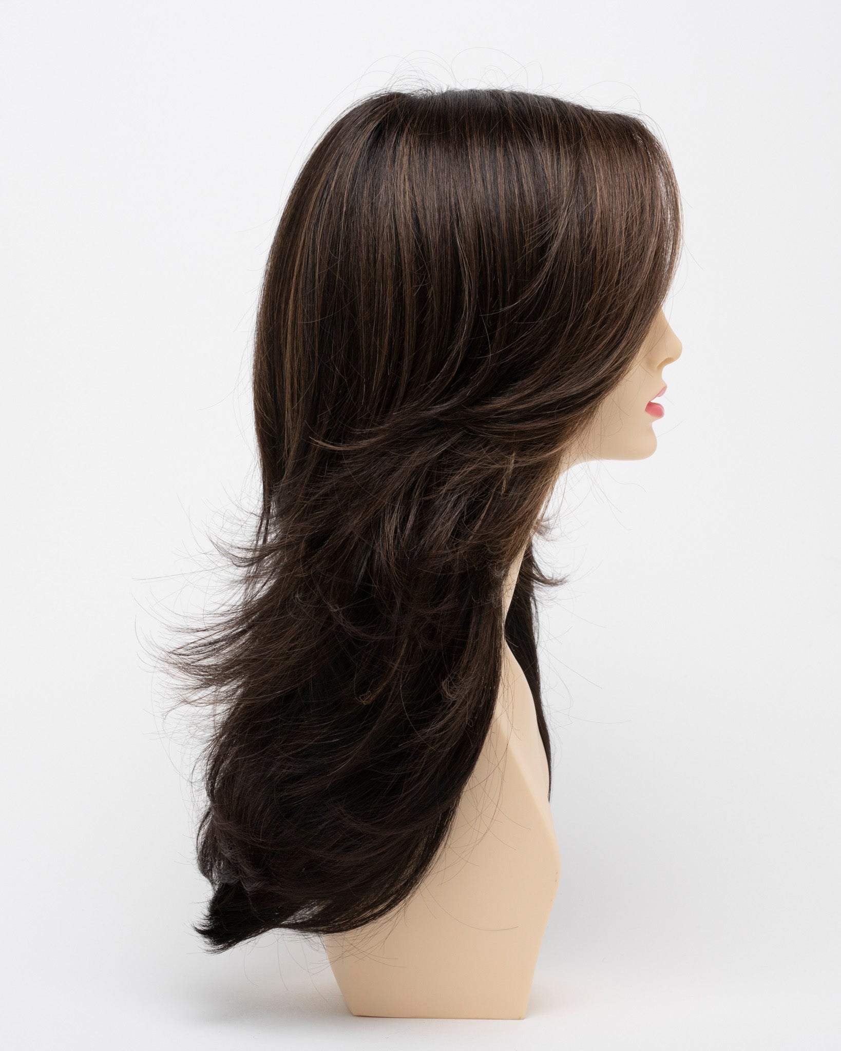 profile side of a long Kinner Beauty Wigs wig for woman on mannequin head