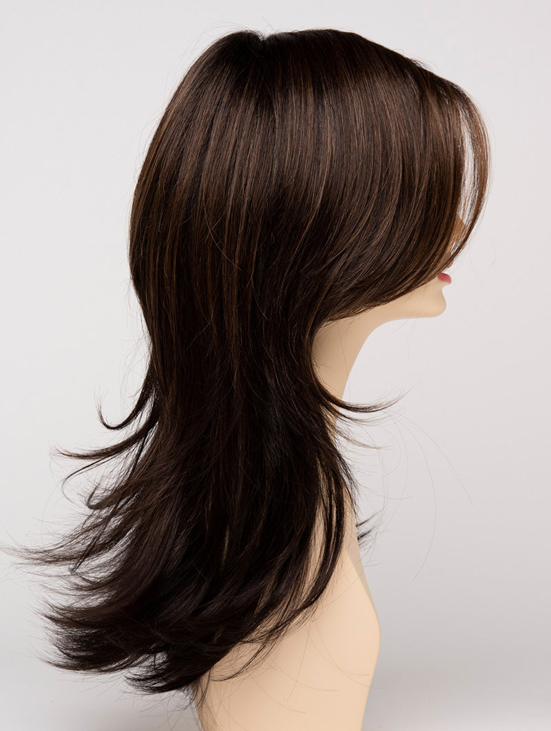 profile side of a long Kinner Beauty Wigs wig for woman on mannequin head