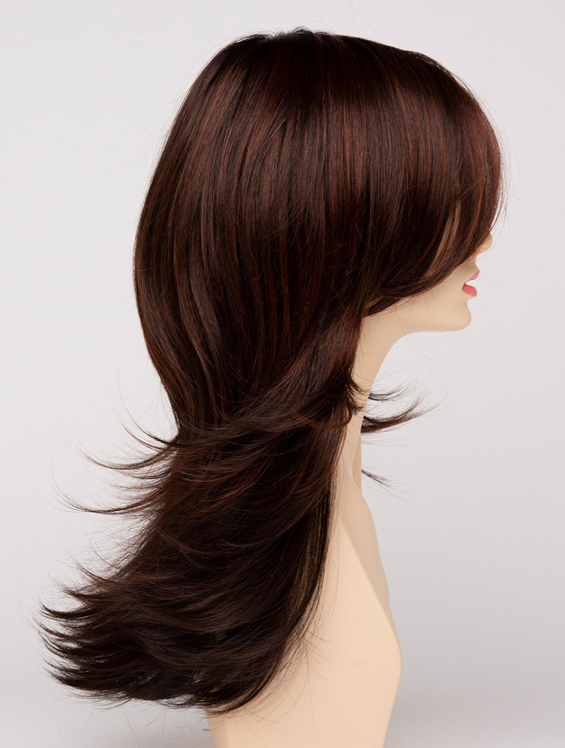 profile side of a long Kinner Beauty Wigs wig for woman on mannequin head