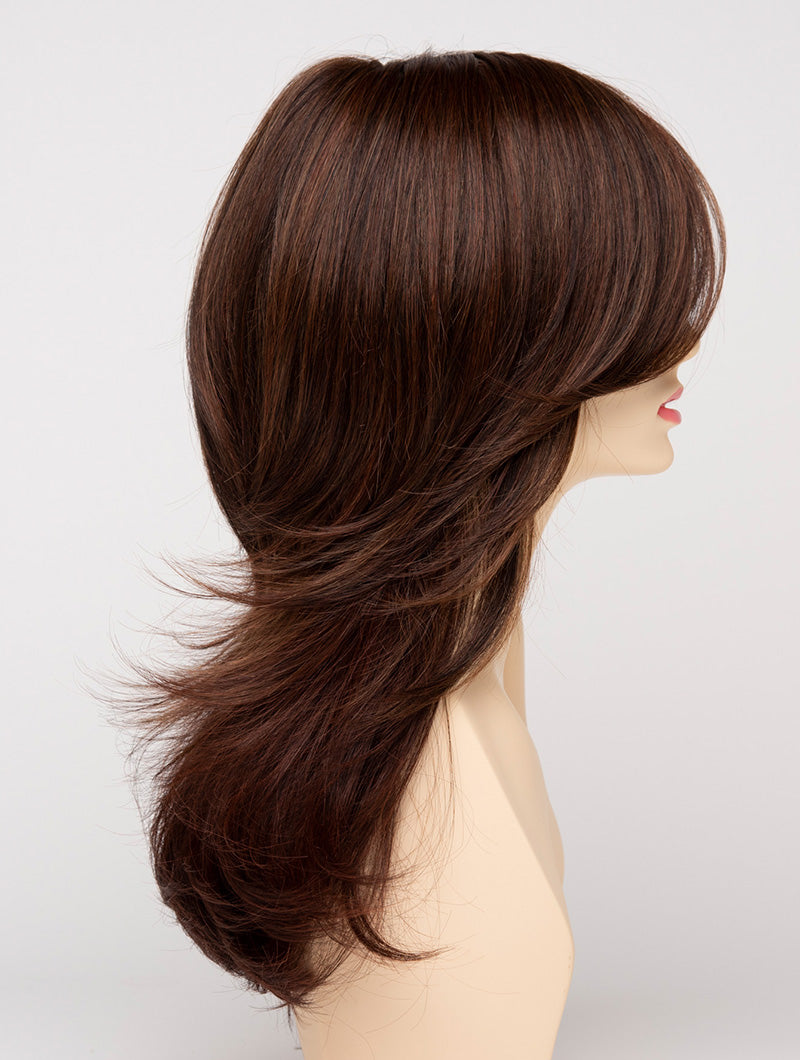 profile side of a long Kinner Beauty Wigs wig for woman on mannequin head