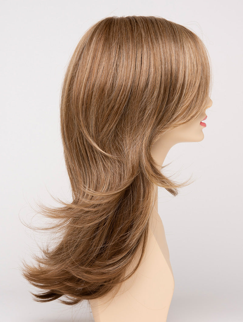 profile side of a long Kinner Beauty Wigs wig for woman on mannequin head