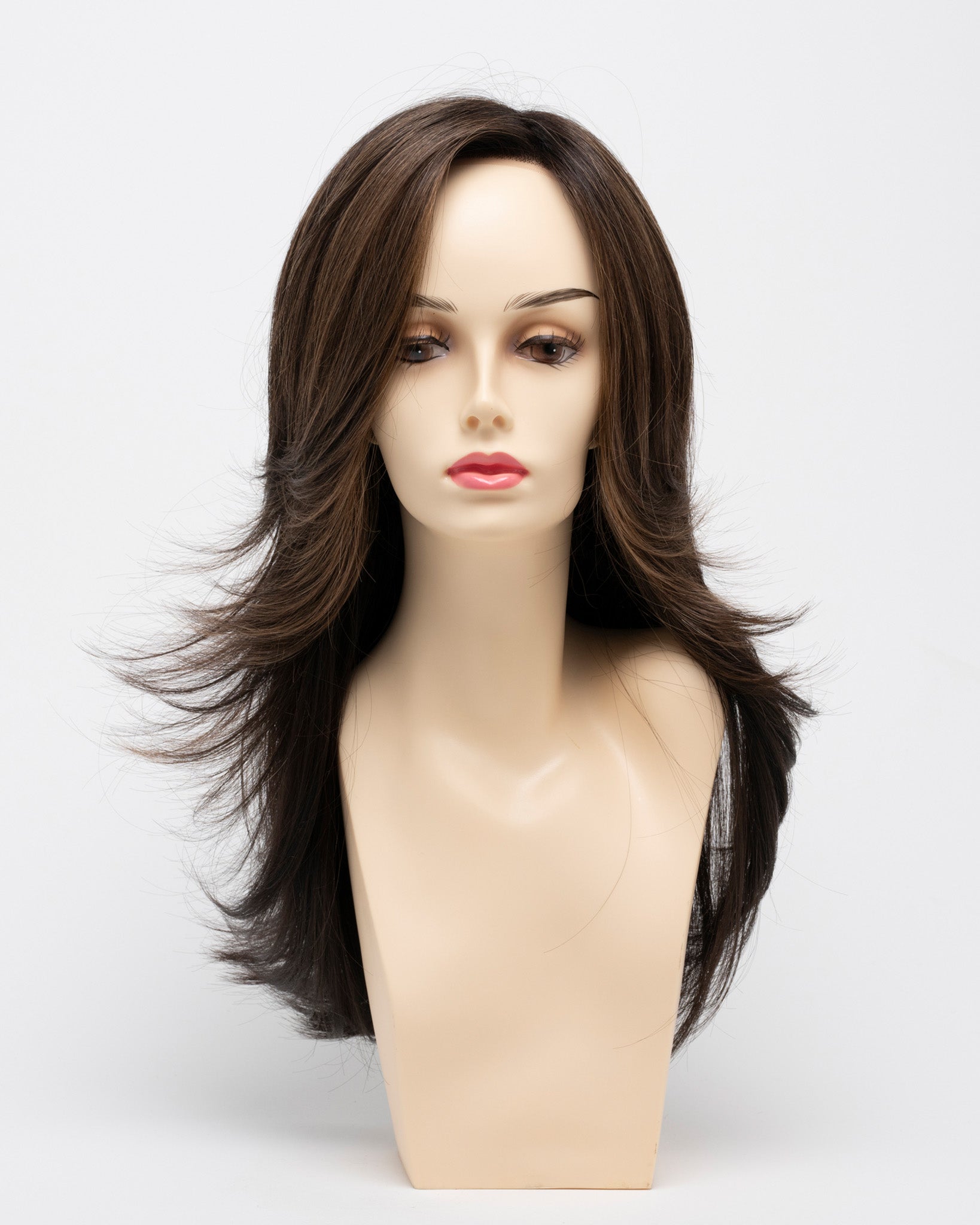 front side of a long Kinner Beauty Wigs wig for woman on mannequin head