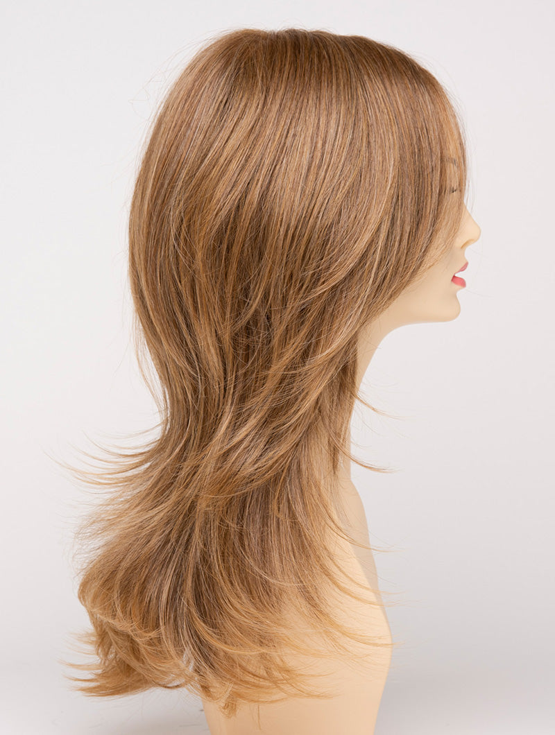 profile side of a long Kinner Beauty Wigs wig for woman on mannequin head