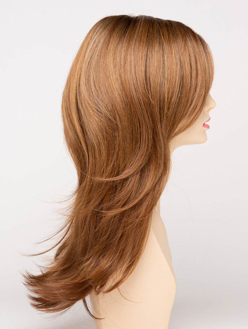 profile side of a long Kinner Beauty Wigs wig for woman on mannequin head
