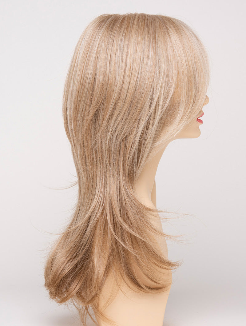 profile side of a long Kinner Beauty Wigs wig for woman on mannequin head