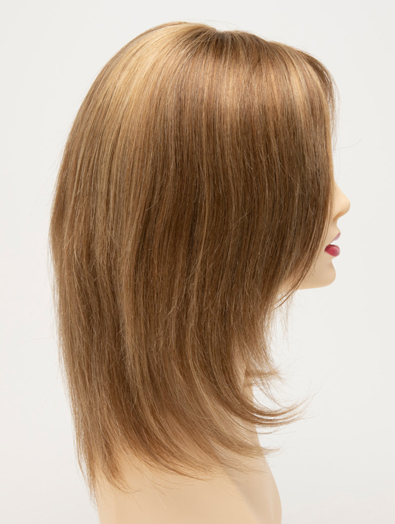 profile side of a medium Kinner Beauty Wigs wig for woman on mannequin head