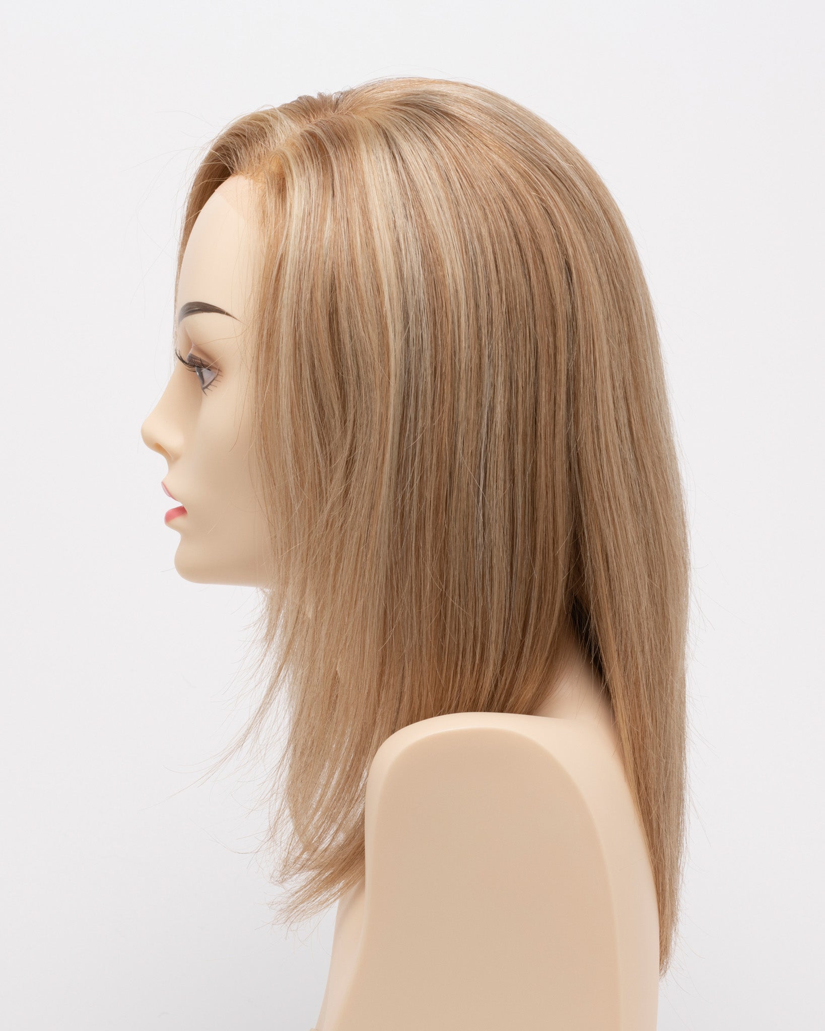profile side of a medium Kinner Beauty Wigs wig for woman on mannequin head