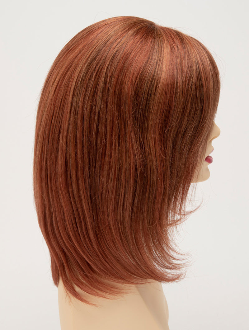 profile side of a medium Kinner Beauty Wigs wig for woman on mannequin head