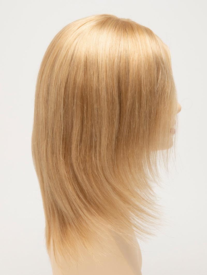 profile side of a medium Kinner Beauty Wigs wig for woman on mannequin head