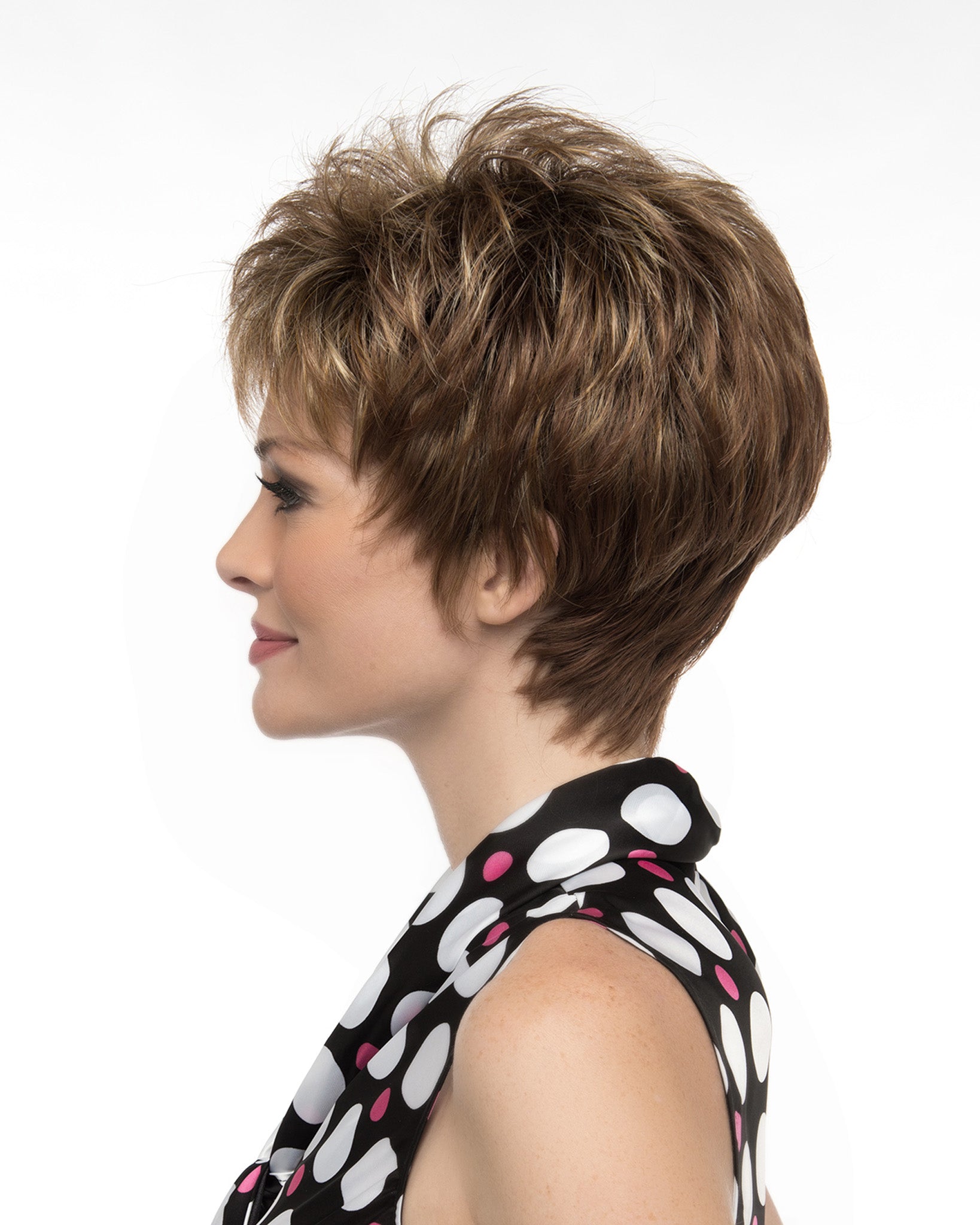 profile side of a short Kinner Beauty Wigs wig on woman head