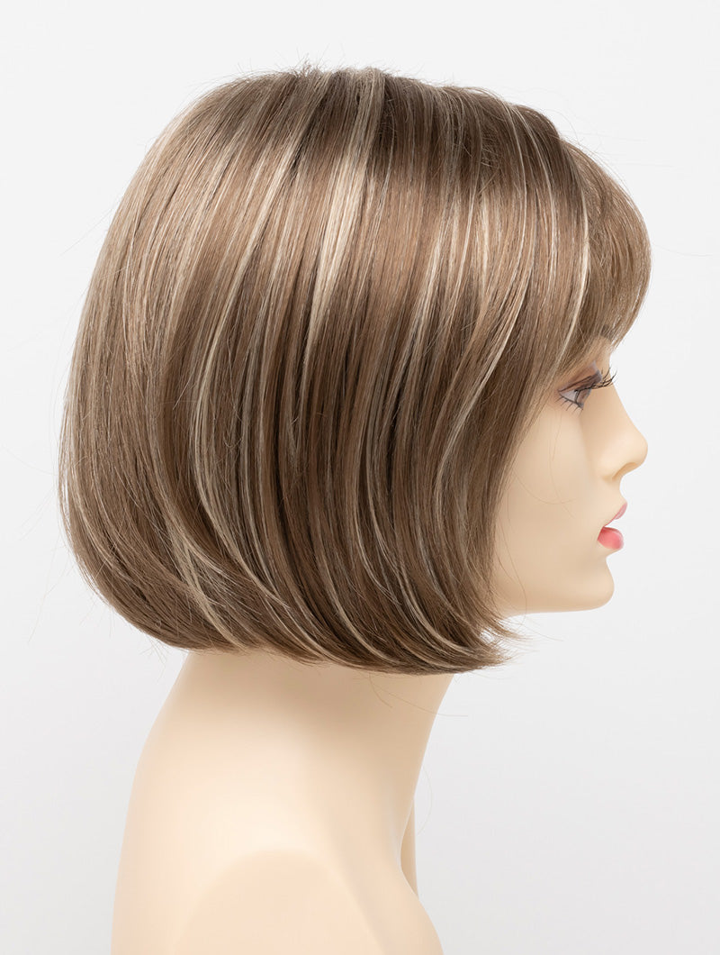profile side of a short Kinner Beauty Wigs wig on woman head