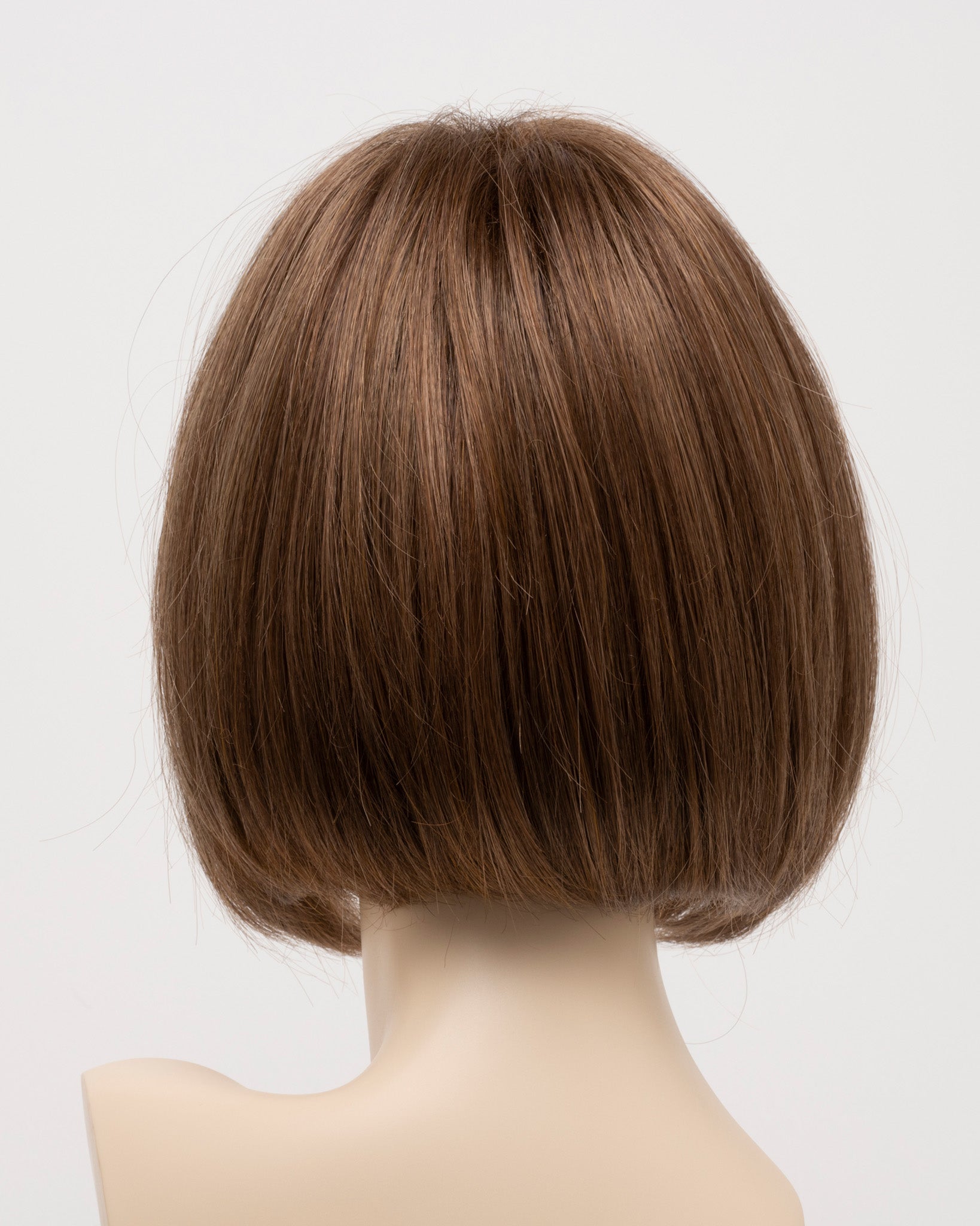 back side of a short wig Kinner Beauty Wigs for woman on mannequin head