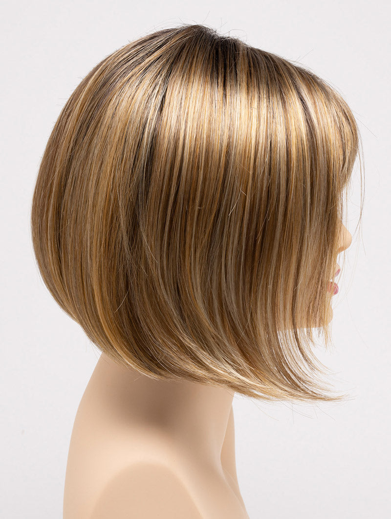 profile side of a short Kinner Beauty Wigs wig on woman head