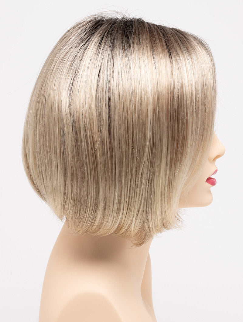 profile side of a short Kinner Beauty Wigs wig on woman head