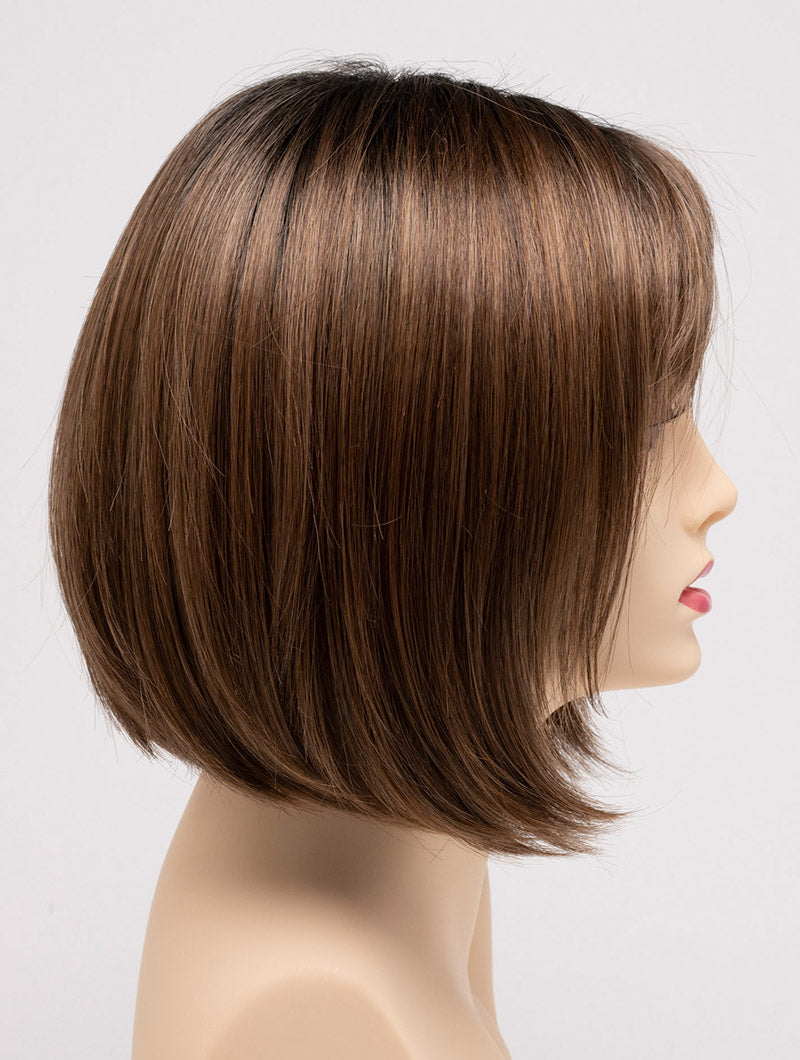 profile side of a short Kinner Beauty Wigs wig on woman head