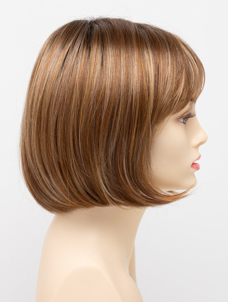 profile side of a short Kinner Beauty Wigs wig on woman head