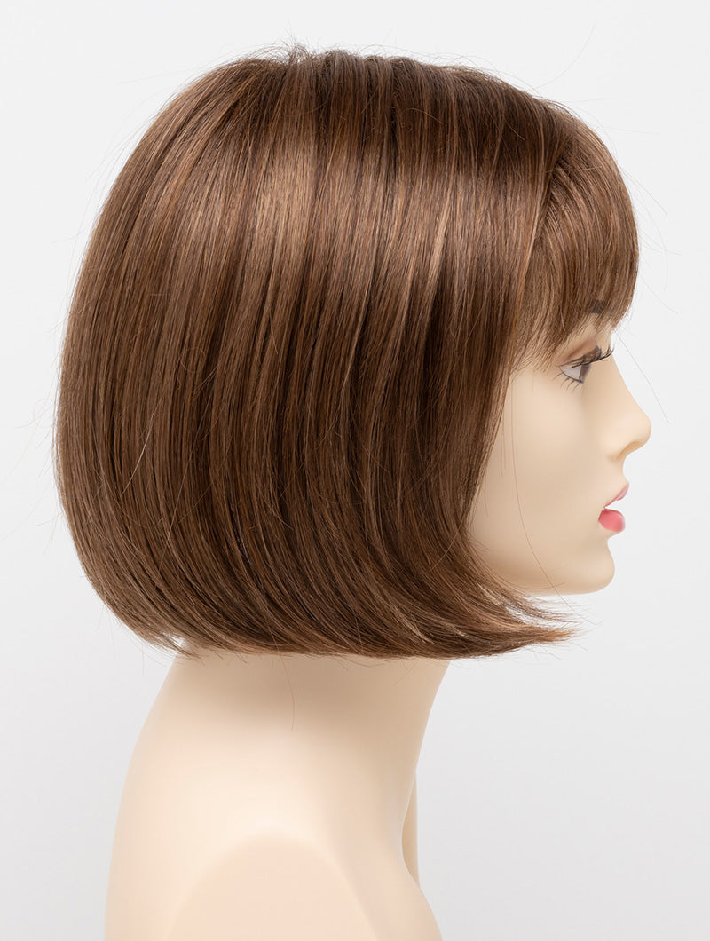 profile side of a short Kinner Beauty Wigs wig on woman head