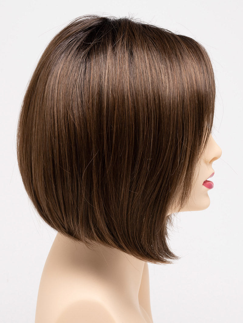 profile side of a short Kinner Beauty Wigs wig on woman head