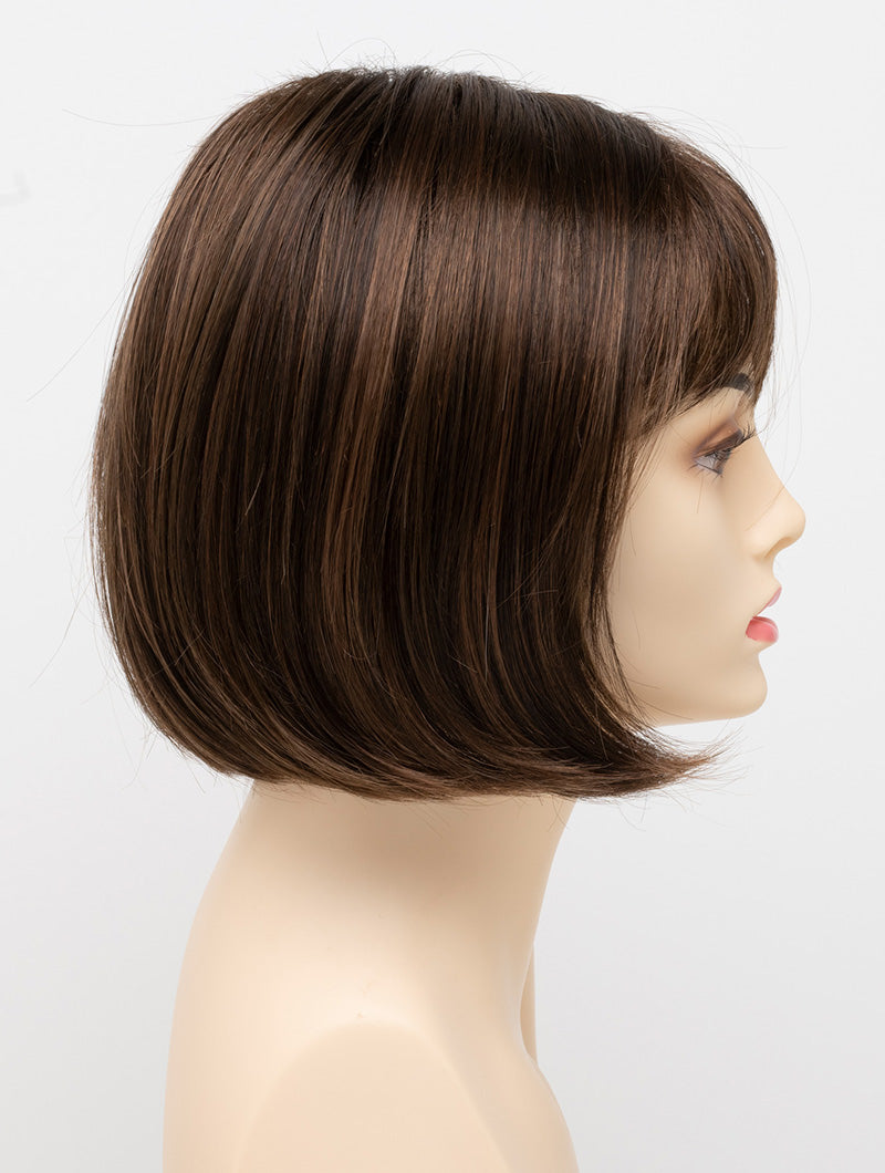 profile side of a short Kinner Beauty Wigs wig on woman head