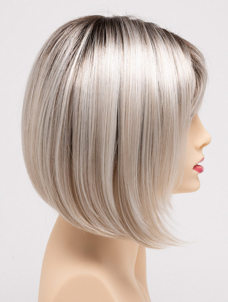 profile side of a short Kinner Beauty Wigs wig on woman head
