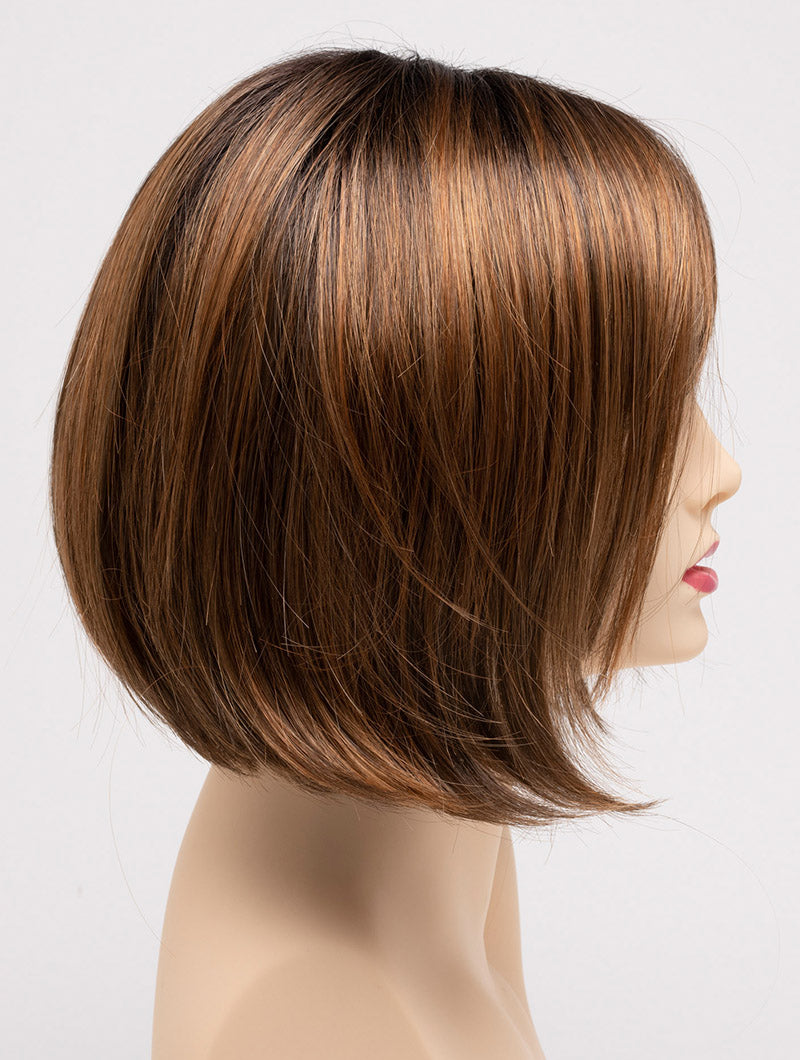 profile side of a short Kinner Beauty Wigs wig on woman head