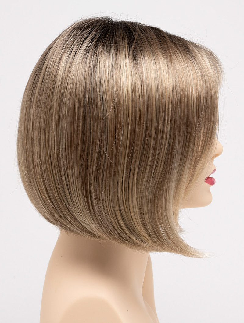 profile side of a short Kinner Beauty Wigs wig on woman head