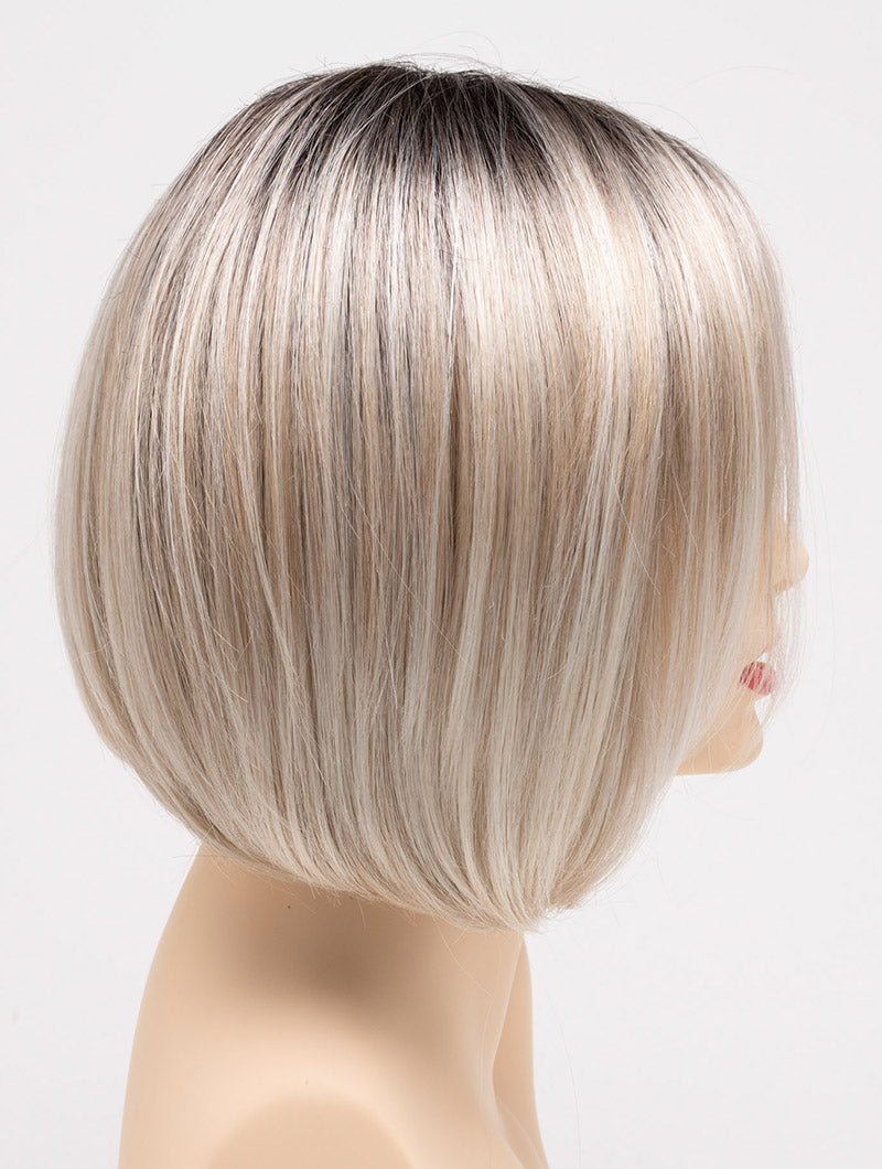 profile side of a short Kinner Beauty Wigs wig on woman head