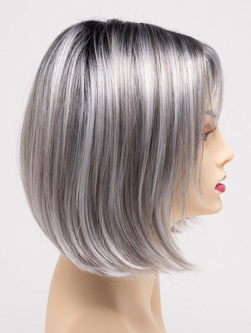 profile side of a short Kinner Beauty Wigs wig on woman head